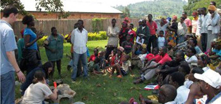 D-Lab Rwanda team demonstrating the use of charcoal press to members of one of the cooperatives we visited.