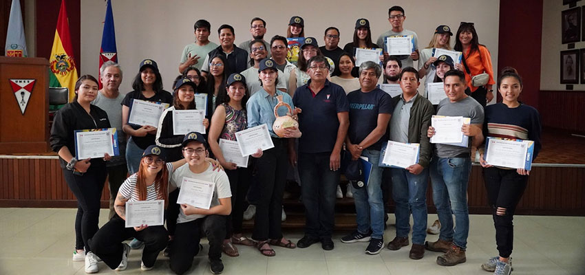 The MIT D-Lab with community partners all proudly displaying their Creative Capacity Building  workshop certificates of completion. Photo: Courtesy MIT D-Lab