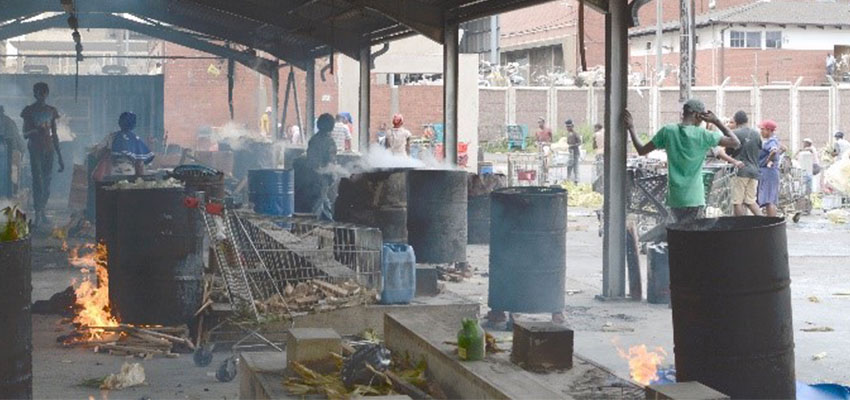 The recently built cooking facility, continues to raise worker’s health and safety concerns, due to the heat and smoke trapped under the roof, and the high plinths from which the drums are rolled off - 1.