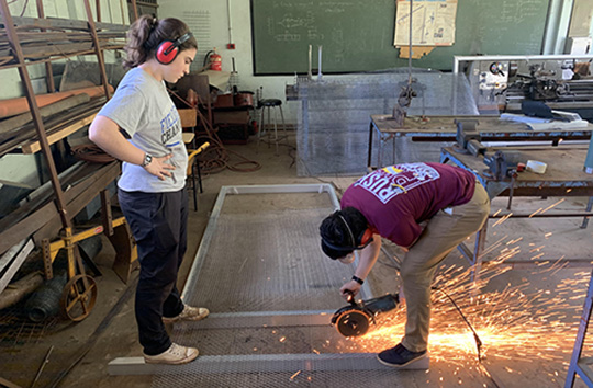 Building a room-sized evaporative cooling chamber on campus at the University of Nairobi.